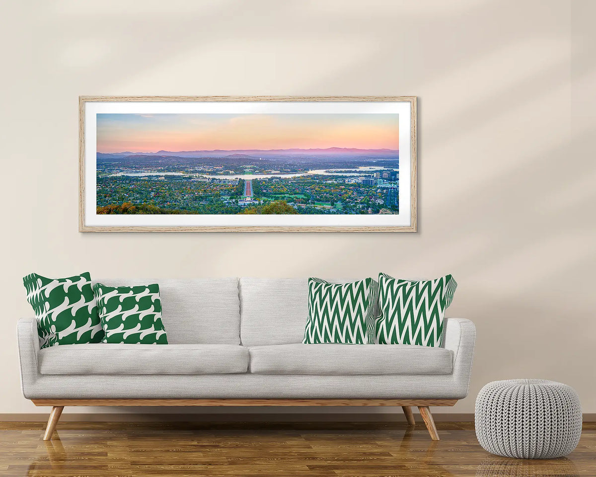 Marion&#39;s View. Canberra artwork framed in Tasmanian oak, above a couch. 