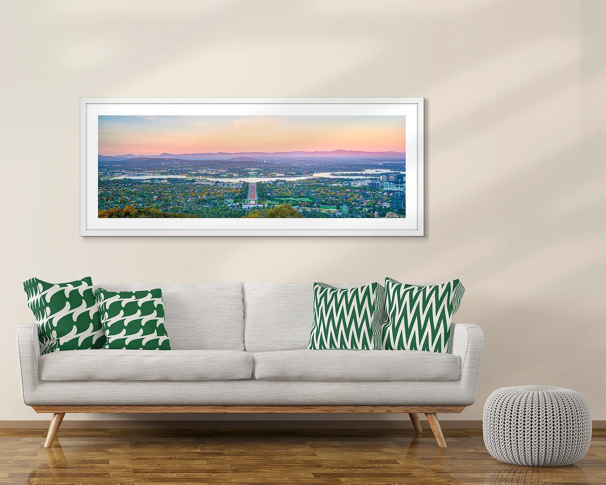 Marion&#39;s View. Canberra artwork framed in white, above a couch. 