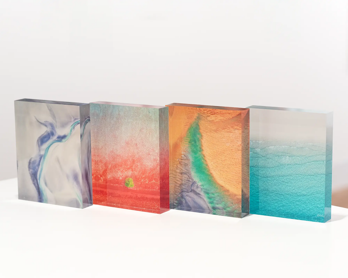 Mini acrylic block displayed next to other aerial photography acrylic blocks. 