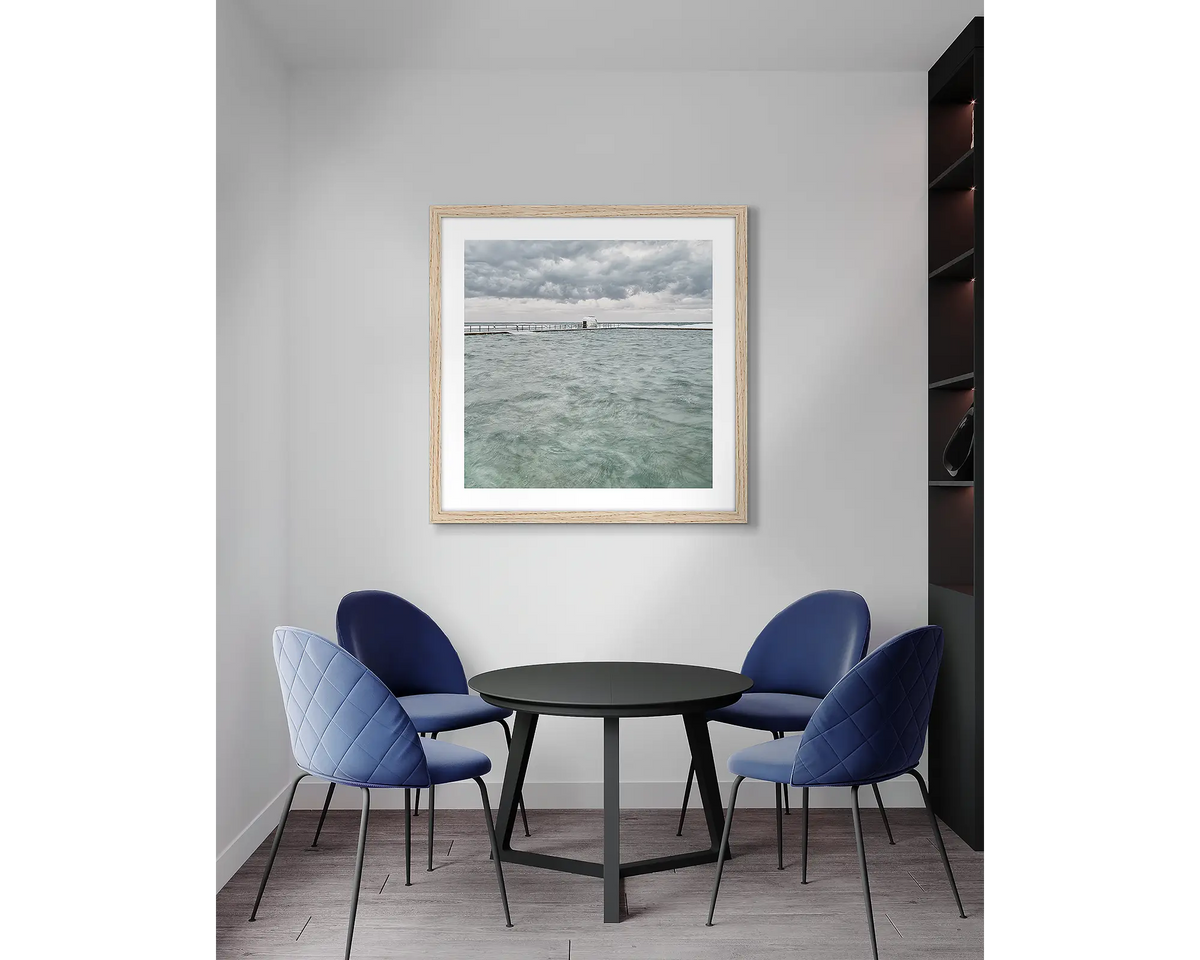 Moody Merewether. Newcastle, wall art print, with a timber frame, in an office meeting room.