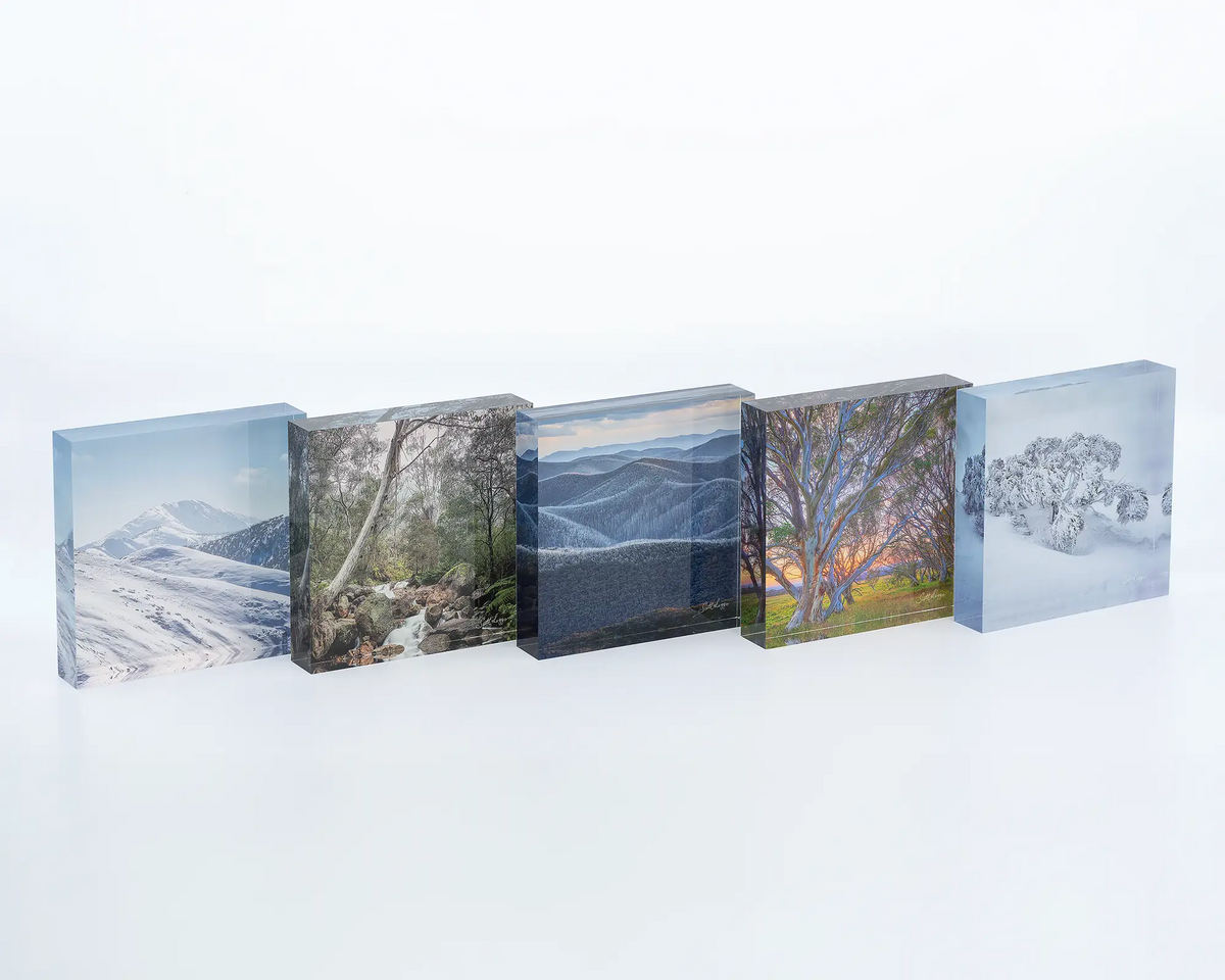 Mountain Flow acrylic block displayed with other mountain themed acrylic blocks. 