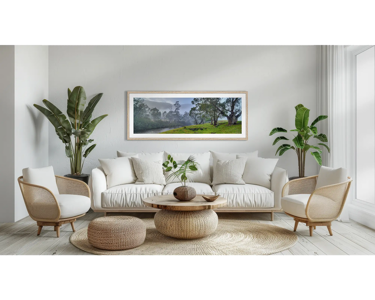 Murray Mystique. Murray River wall art print, with a Tassie oak frame, above a couch. 