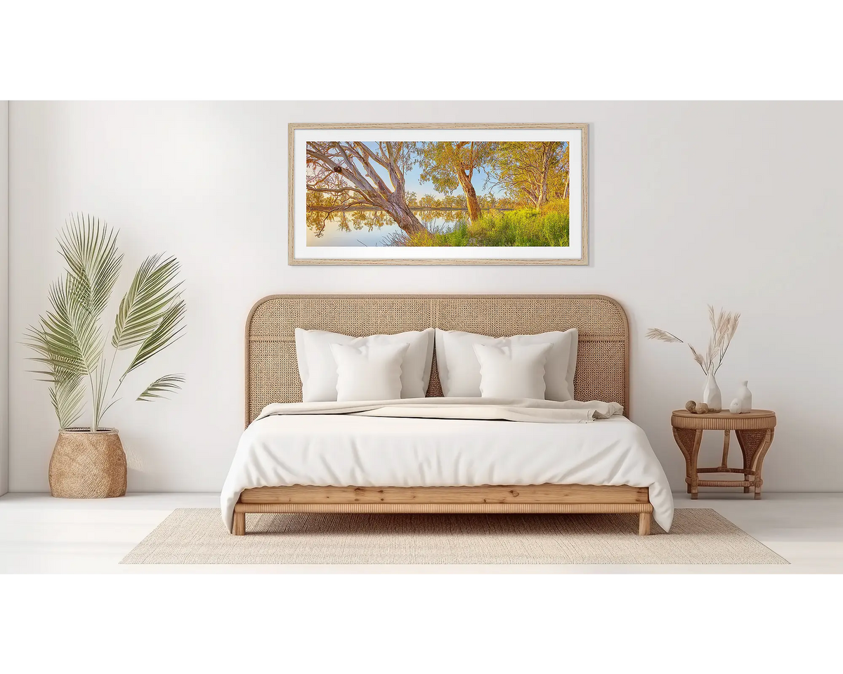 Murray Sunrise. South Australian wall art, in a wood frame, in a bedroom. 