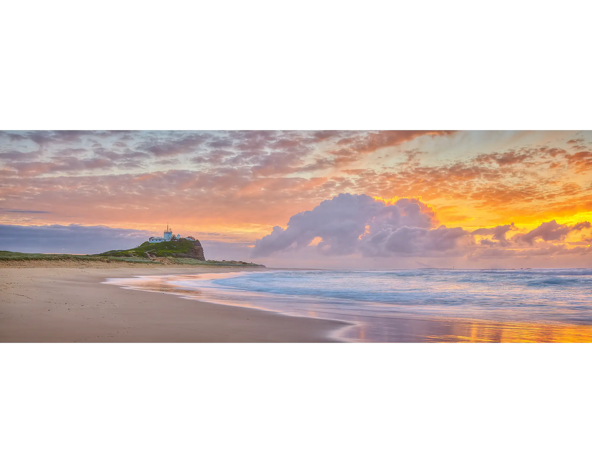 Cloudy sunrise at Nobbys beach, Newcastle, NSW. 