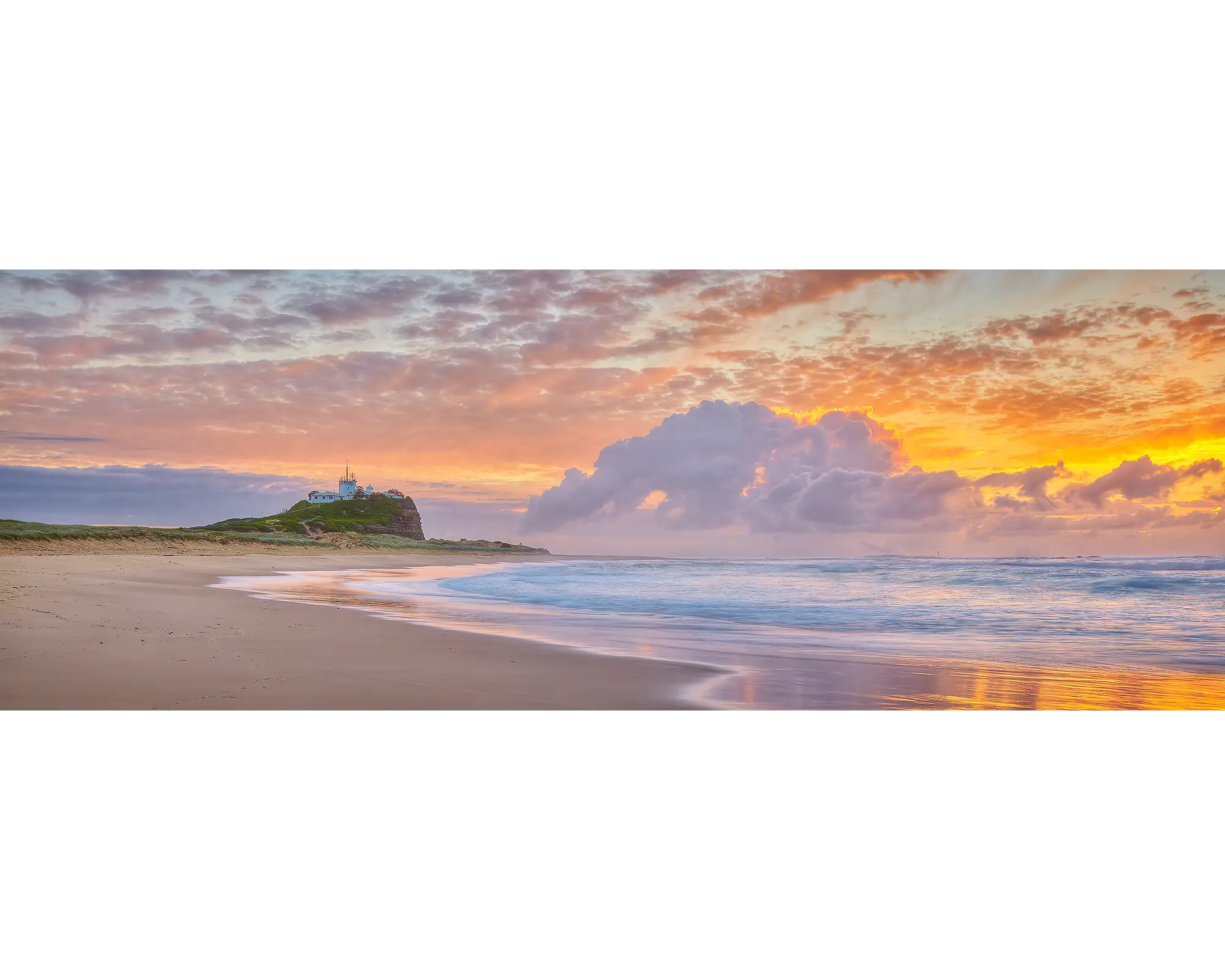 Cloudy sunrise at Nobbys beach, Newcastle, NSW. 