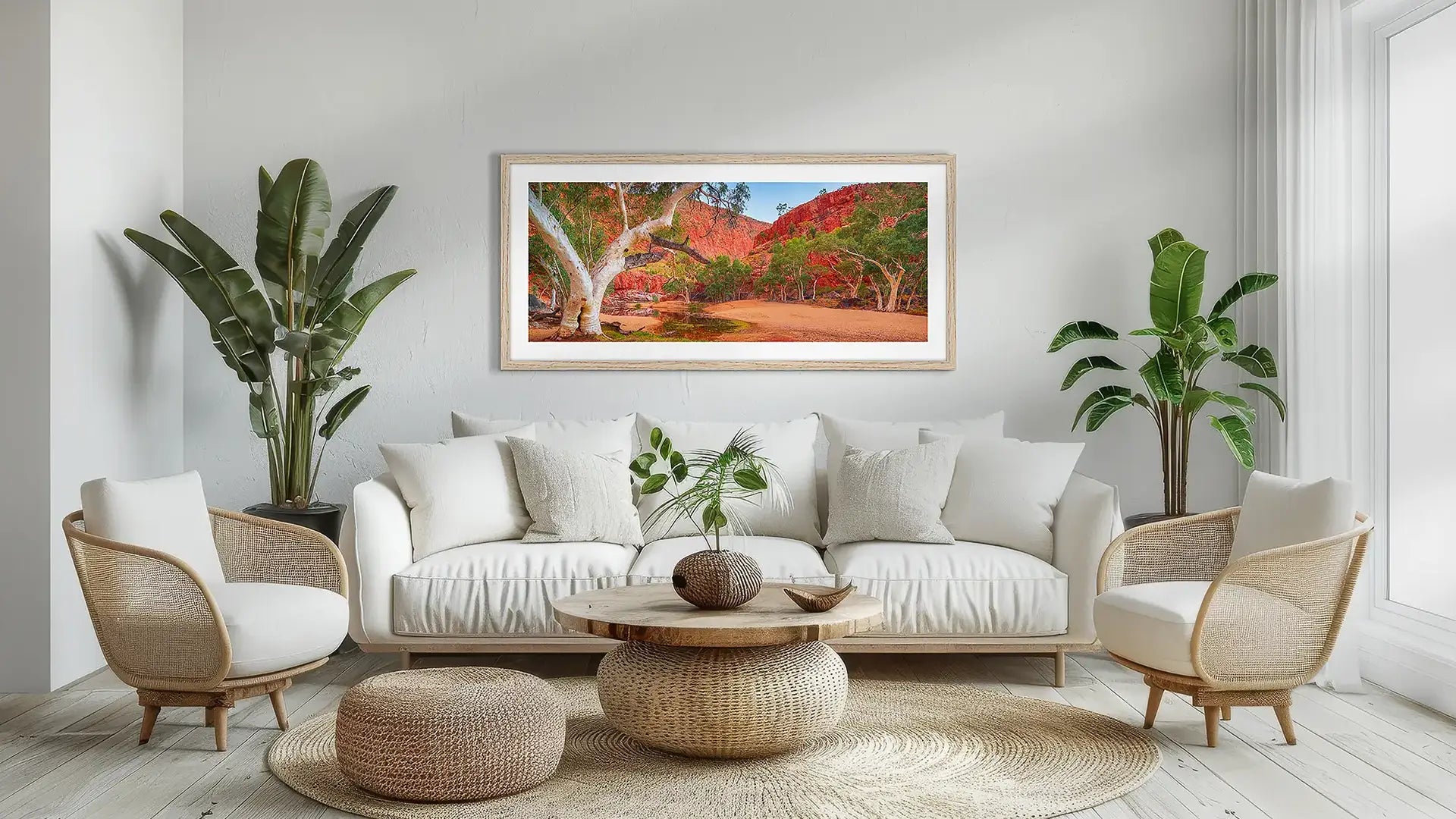 Northern Territory wall art print with timber frame above couch.