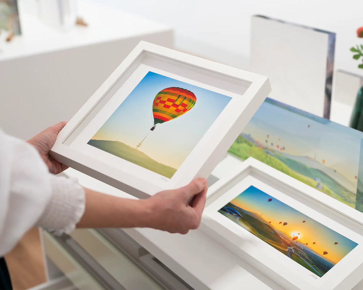 On Top. Hot Air Balloon over Telstra Tower small framed print with a white frame.