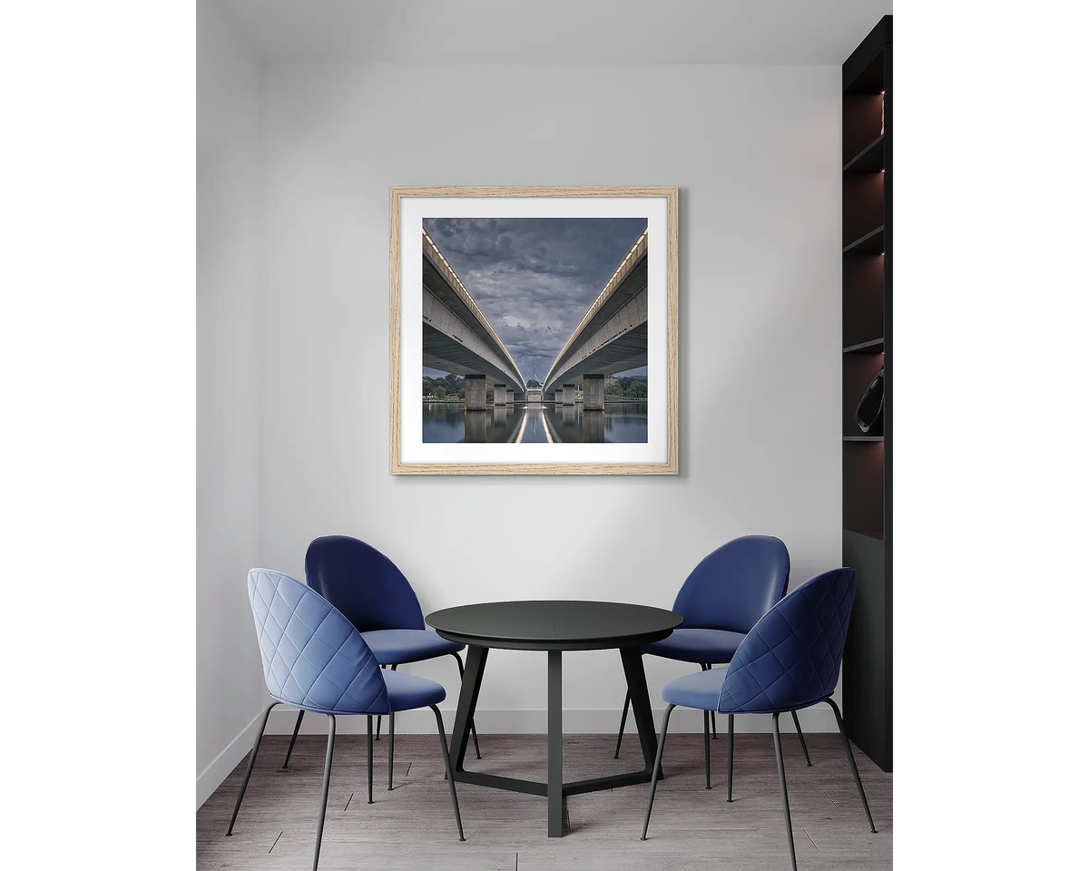 One Direction. Framed Canberra wall art print, with a timber frame, in an office meeting room. 