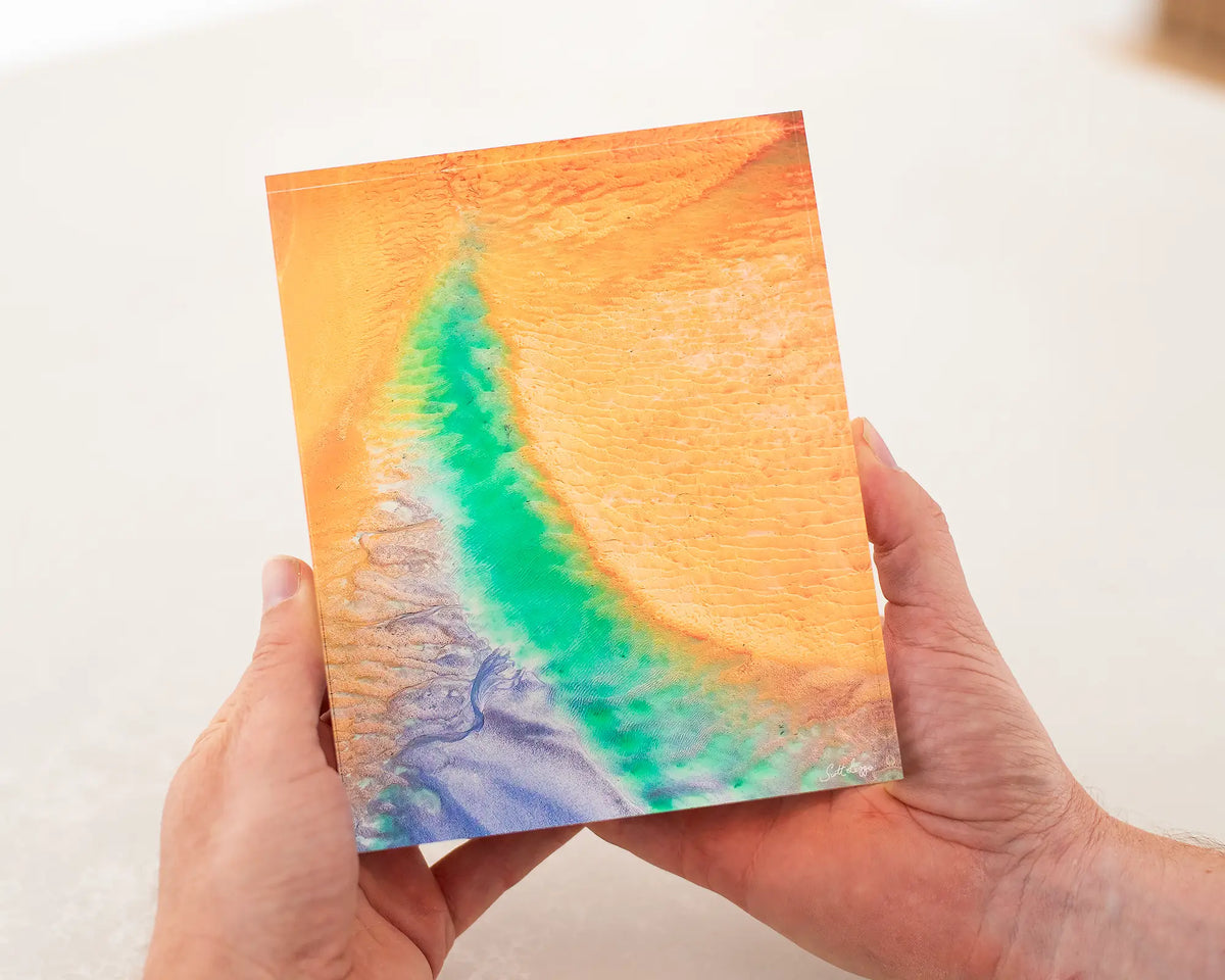 Opal Illusion acrylic block being held. 