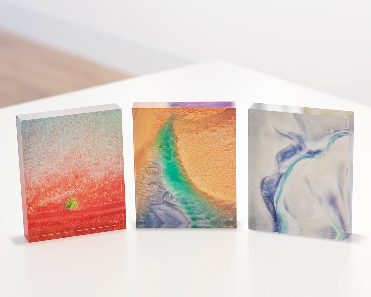 Opal Illusion acrylic block displayed with other acrylic blocks at the Scott Leggo Gallery. 