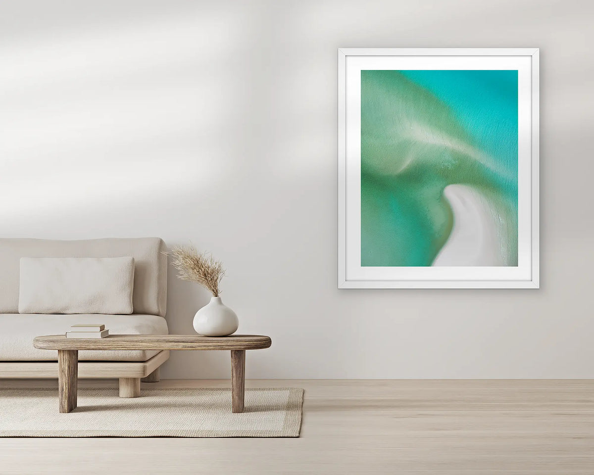 Opal Waters. Extra large wall art print, with a white frame, in a living room. 