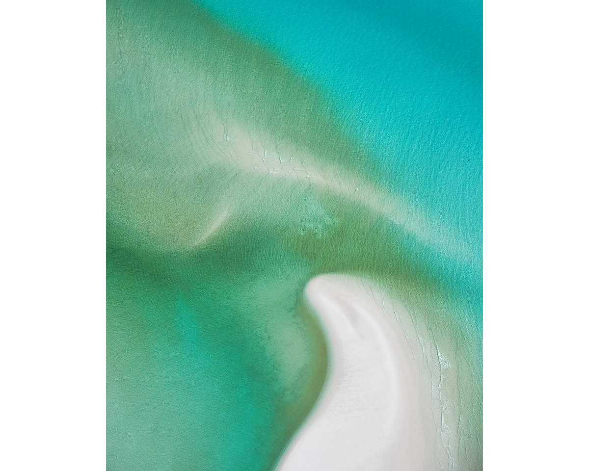 The green and aqua waters of Hill Inlet seen from above, Whitsunday Island, Queensland. 