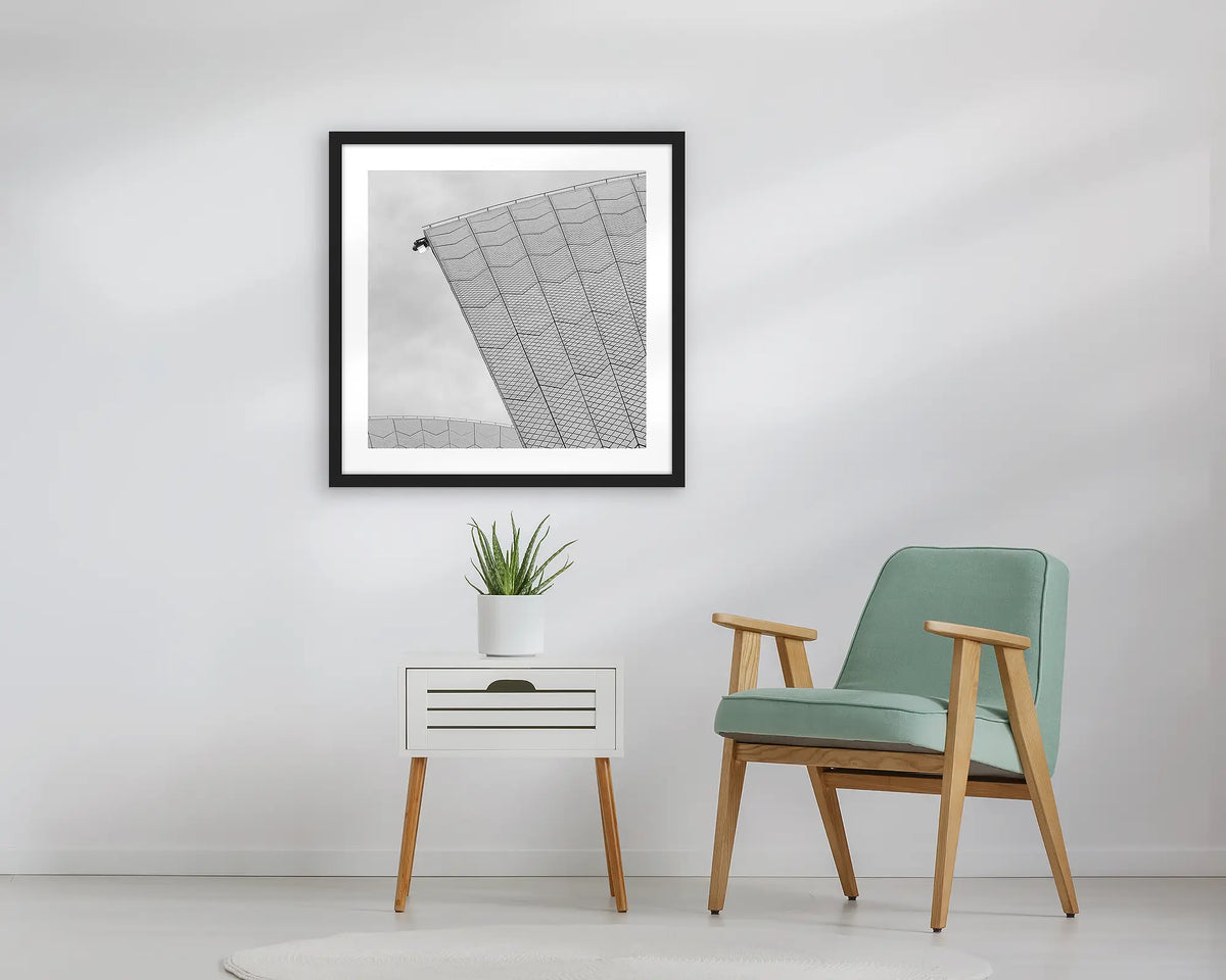 Opera House Shells. Sydney framed wall art print, with a black frame, in an entry foyer. 