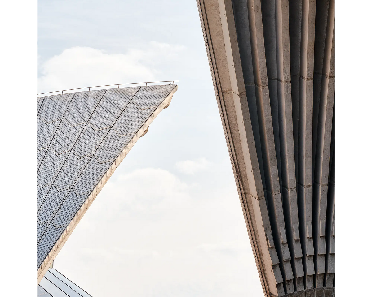 Sydney Opera House with clouds in the background.