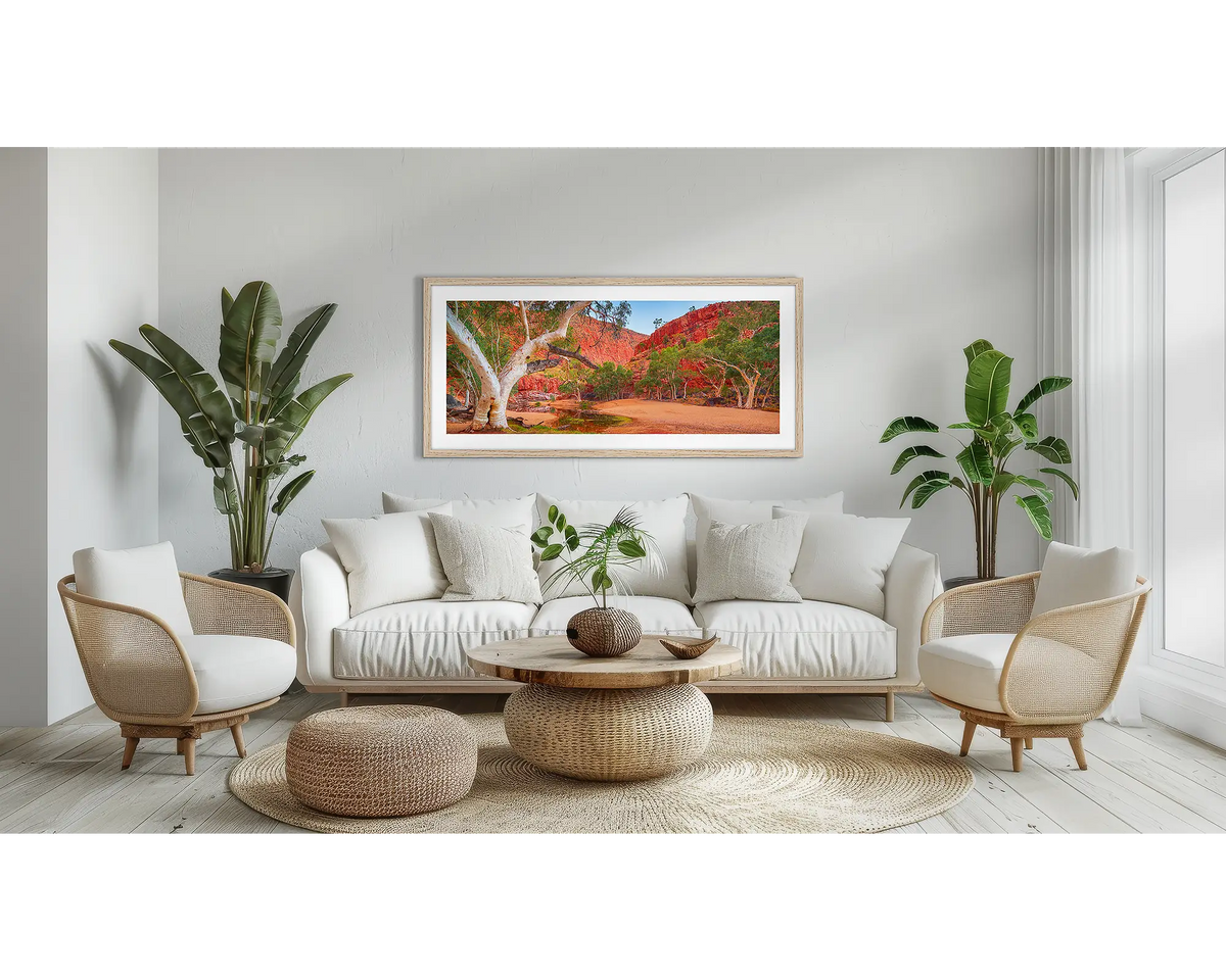 Ormiston Sanctuary. Outback wall art print, with a timber frame, above a couch. 