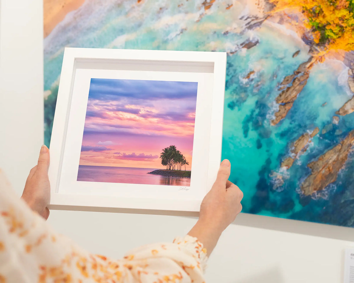 Paradise Palms. Port Douglas colourful sunrise, small framed print in a white frame.