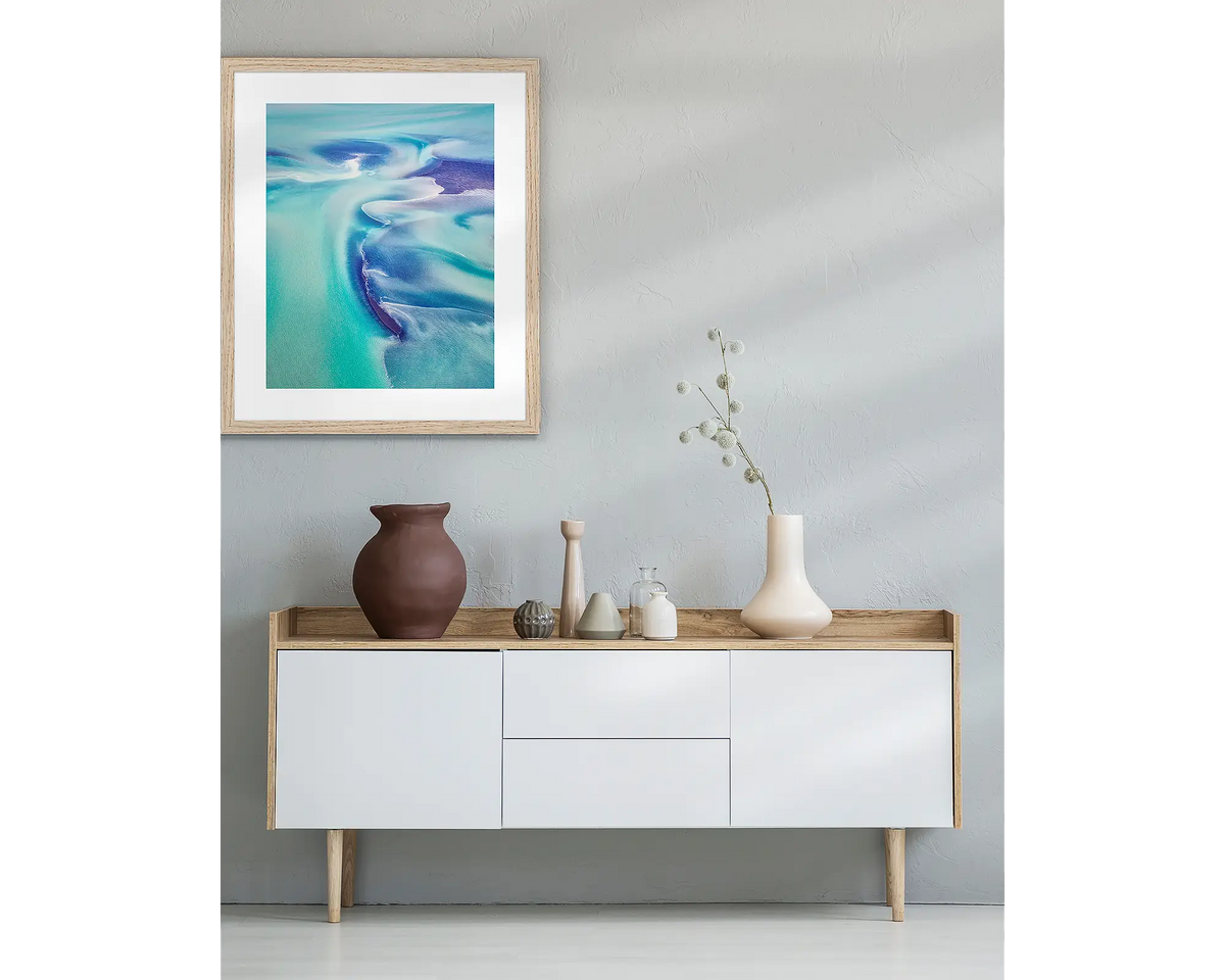 Permeate. Framed Kimberley wall art with a Tasmanian Oak frame, above a side table.