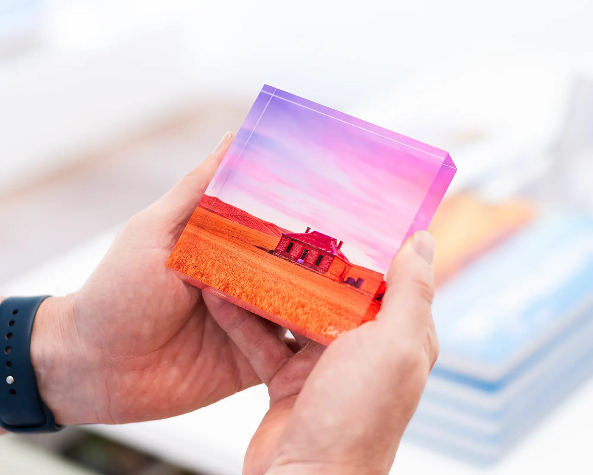 Pioneer acrylic block being held. 