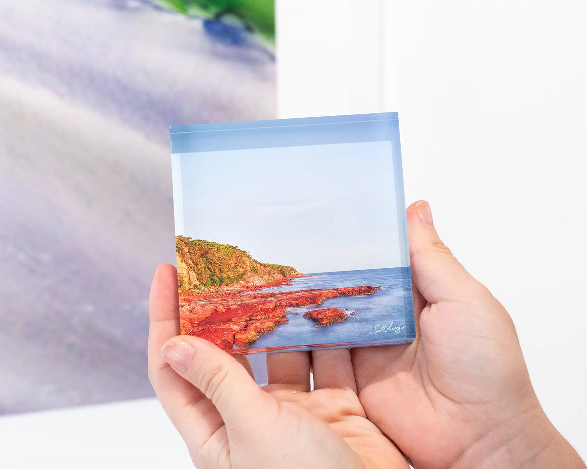 Point acrylic block being held. 