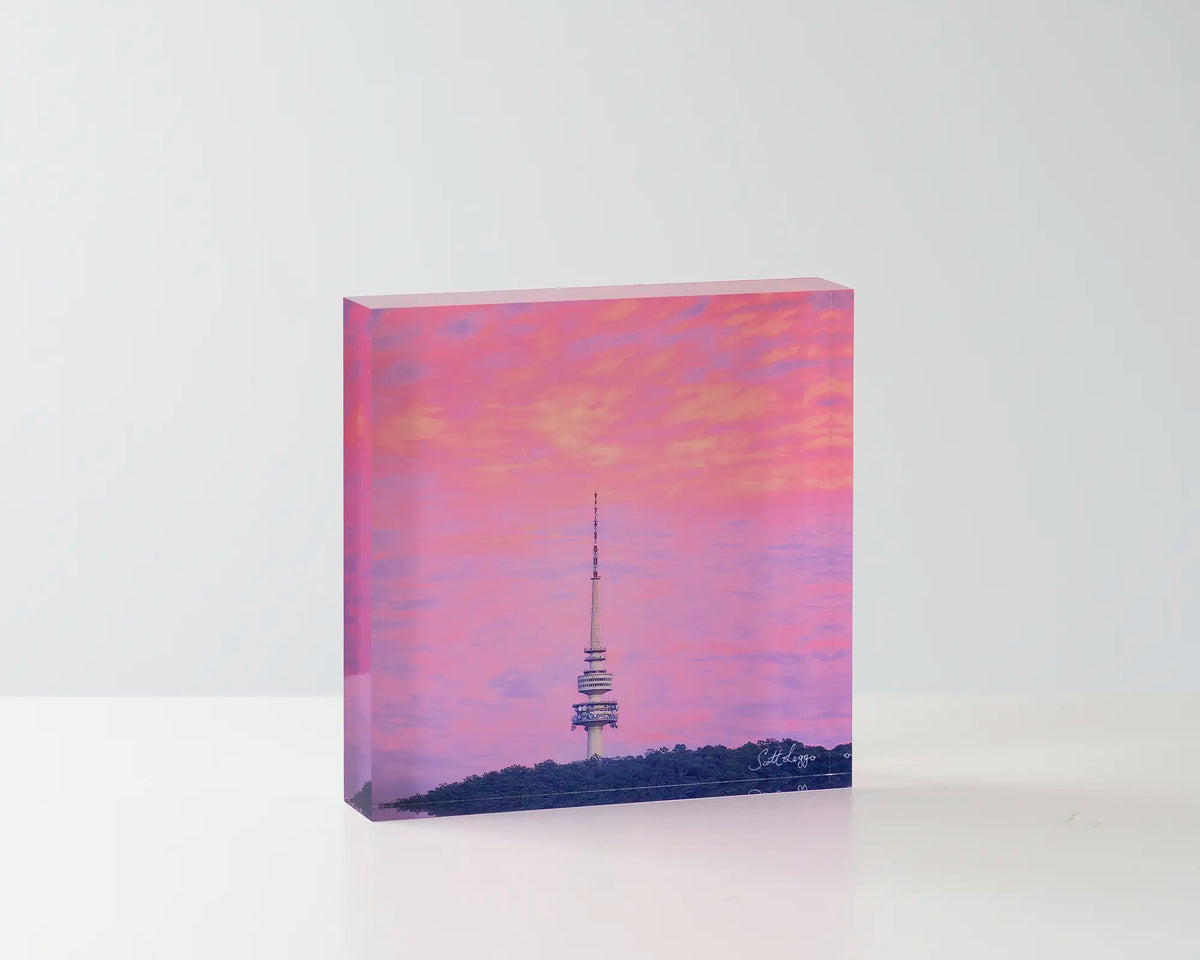 Pointer. Acrylic block Telstra Tower, Canberra Artwork on table.