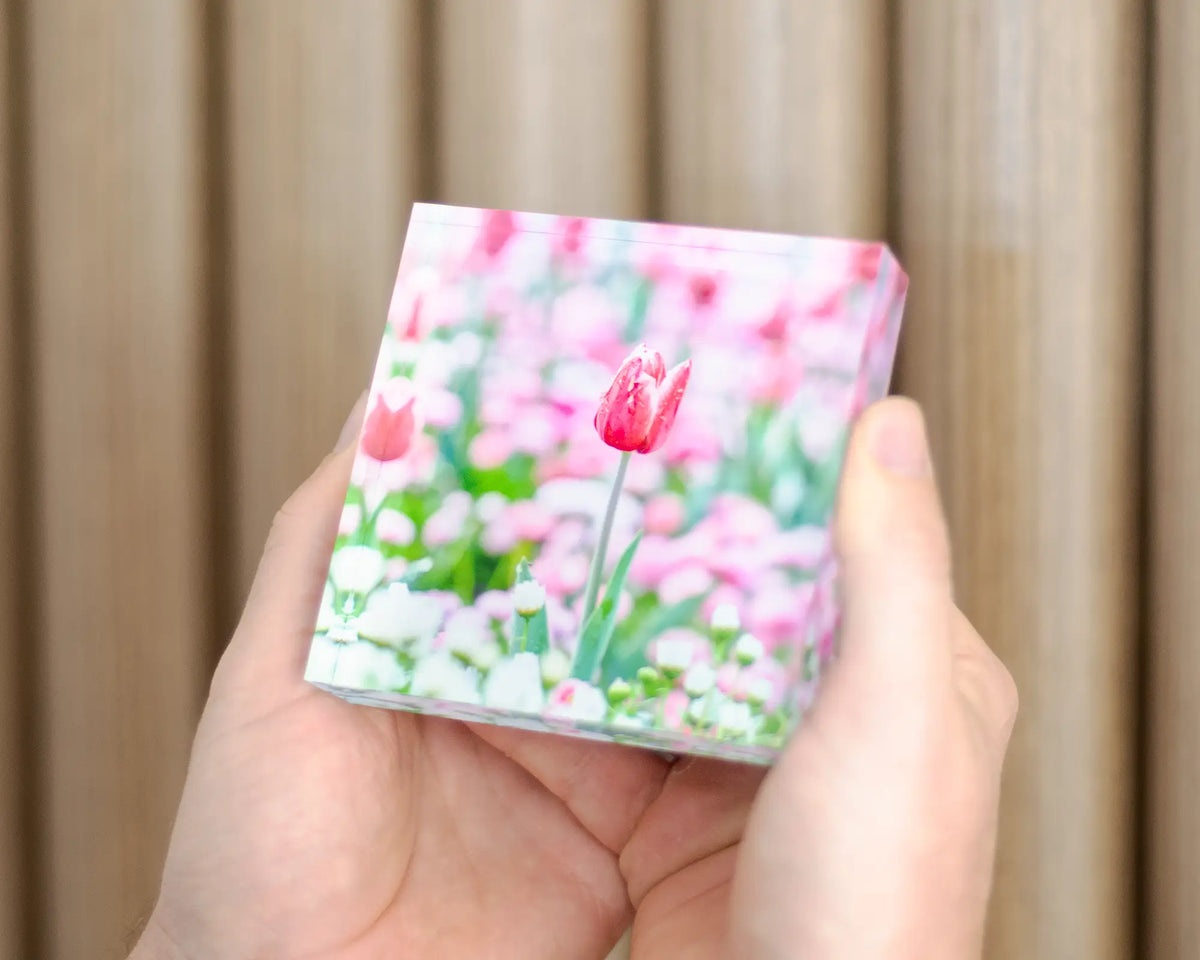 Pretty in Pink acrylic block being held. 