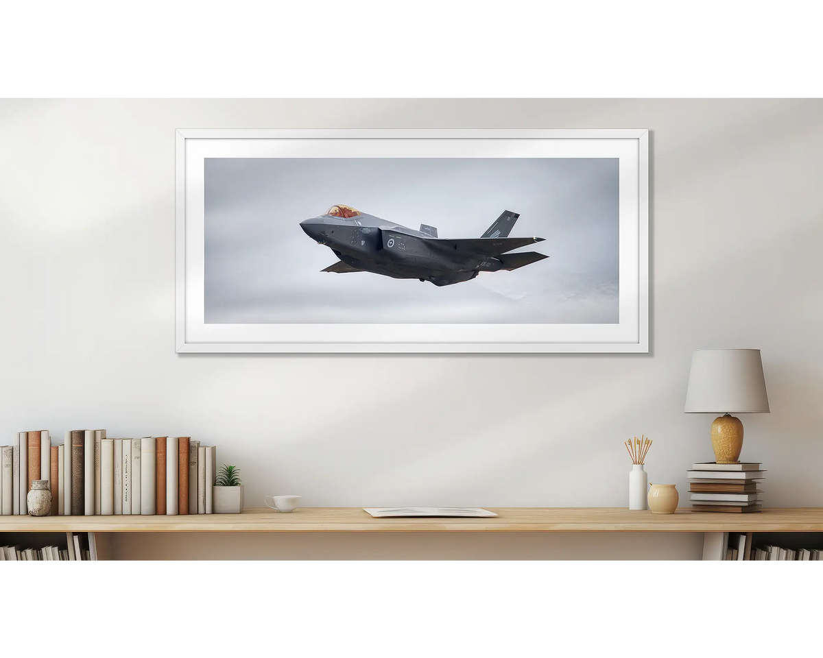 Raider. Jsf fighter aircraft, wall art print, in a white frame, in an office.