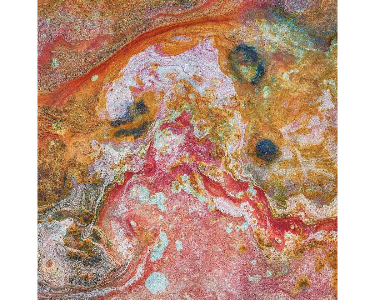 Aerial view of colours and textures of coastal rock at Cable Beach, Broome, WA. 