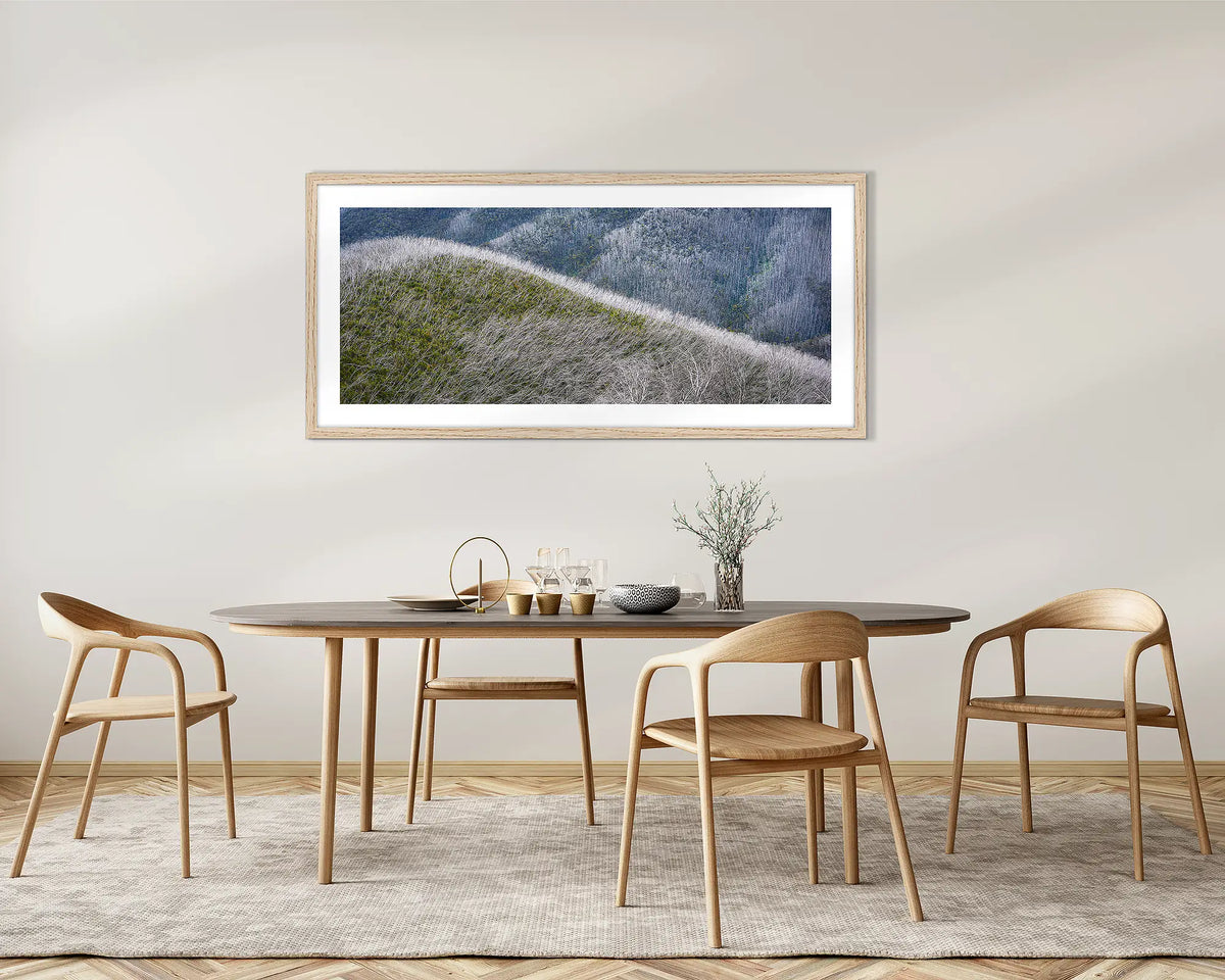 Recovery. Alpine framed wall art with a Tassie oak frame, on a dining room wall. 