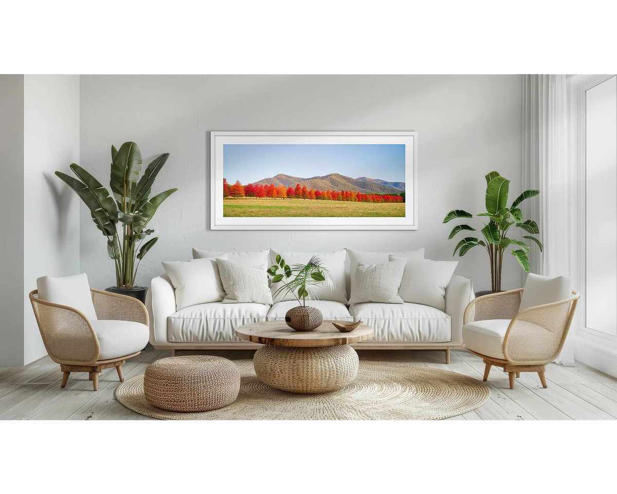 Red Line. Autumn wall art in a white frame, in a lounge room.