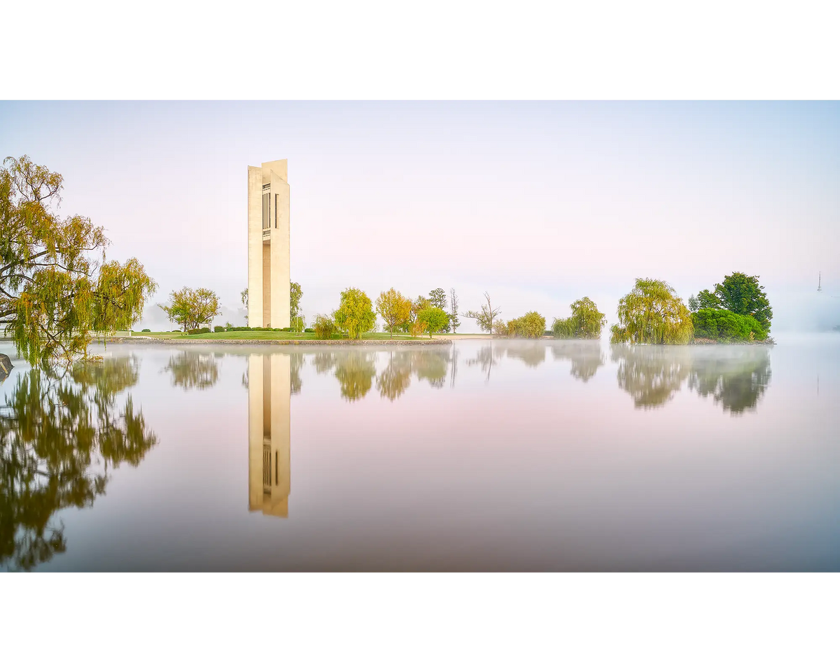 National Carillon surrounded by fog with reflections in Lake Burley Griffin below, Canberra, ACT. 