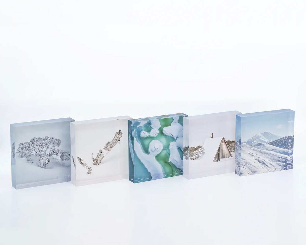 Remnant acrylic block displayed with other snow themed acrylic blocks. 