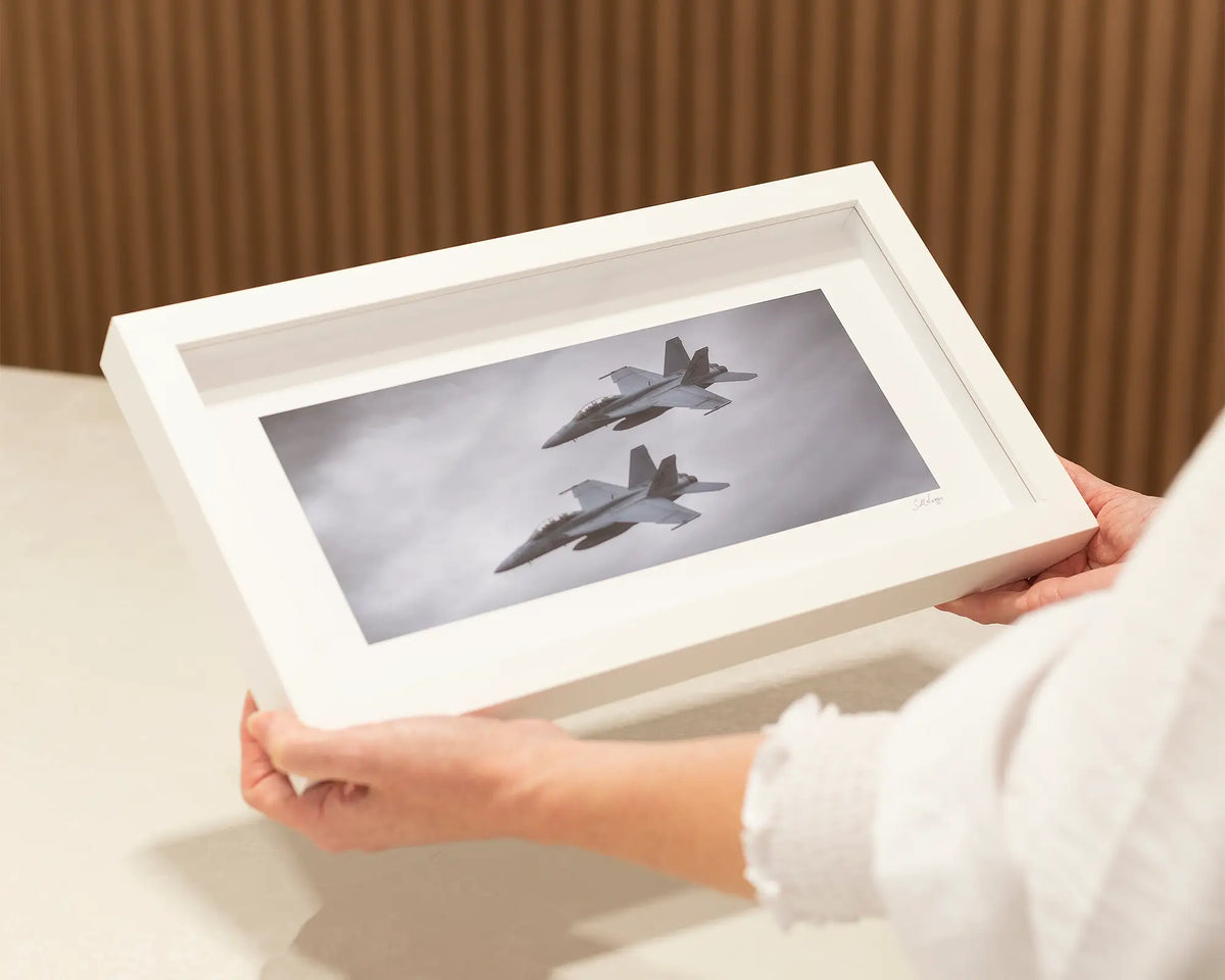 Rhino Pair. F-18 Super hornets small framed print with white frame.