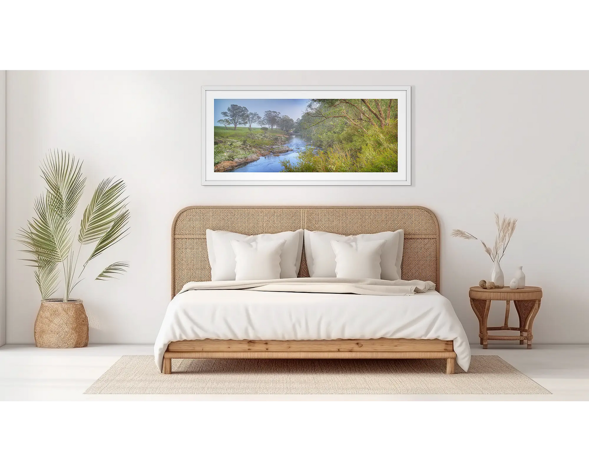 Riverside Veil. Murray river wall art, in a white frame, in a bedroom. 