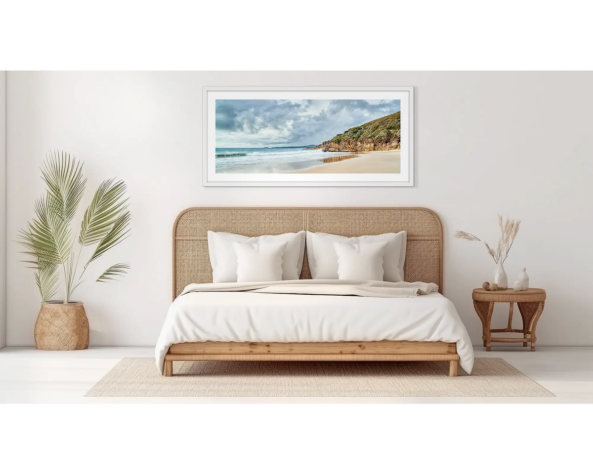 Rolling In. Zenith beach coastal wall art, in a white frame, on a bedroom wall. 