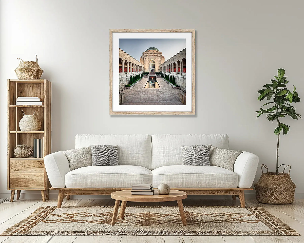 Sacrifice. Australian War Memorial wall art print, with a Tassie oak frame, above a couch. 