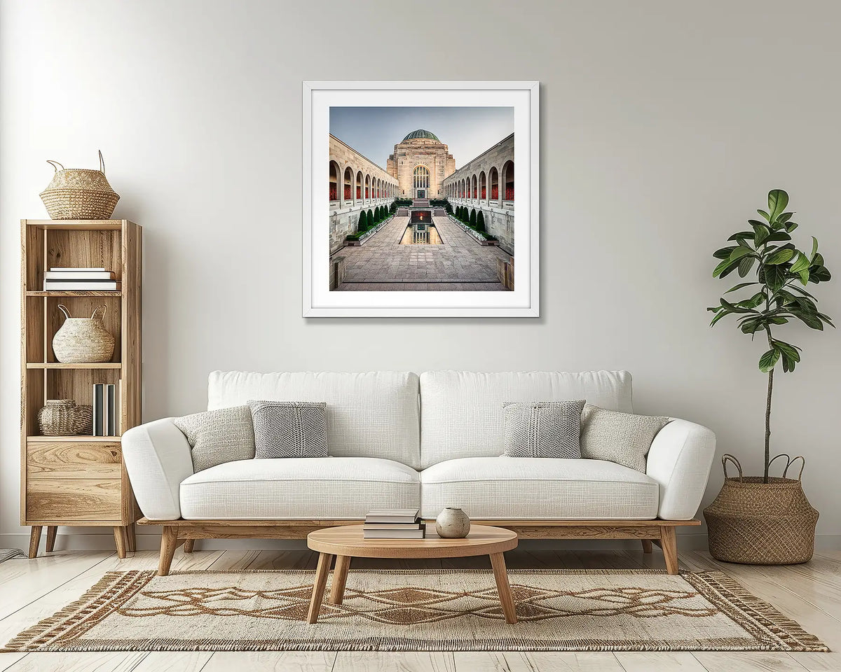 Sacrifice. Australian War Memorial wall art print, with a white frame, above a couch. 