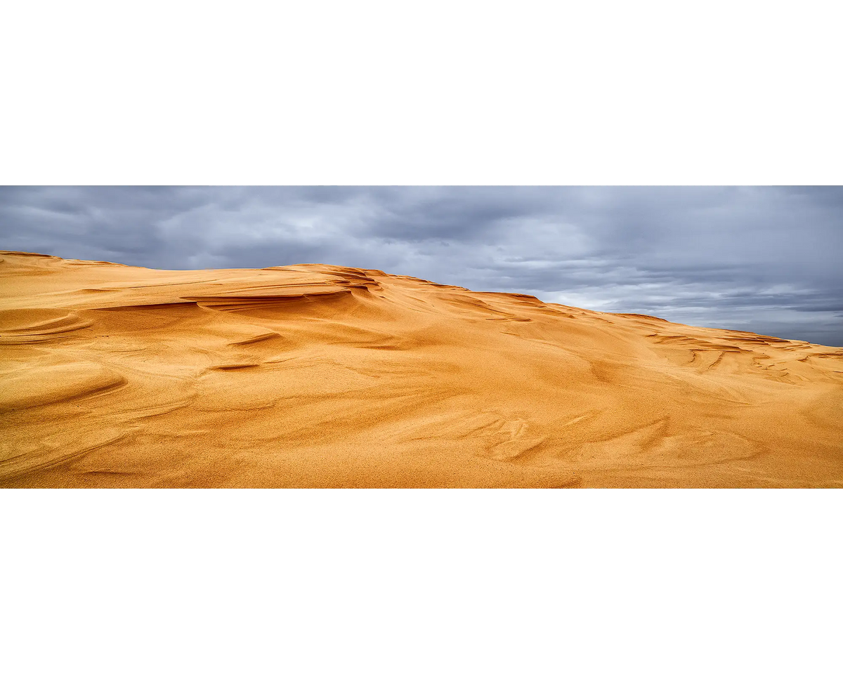 Storm clouds over sand dunes at Stockton Beach, NSW. 