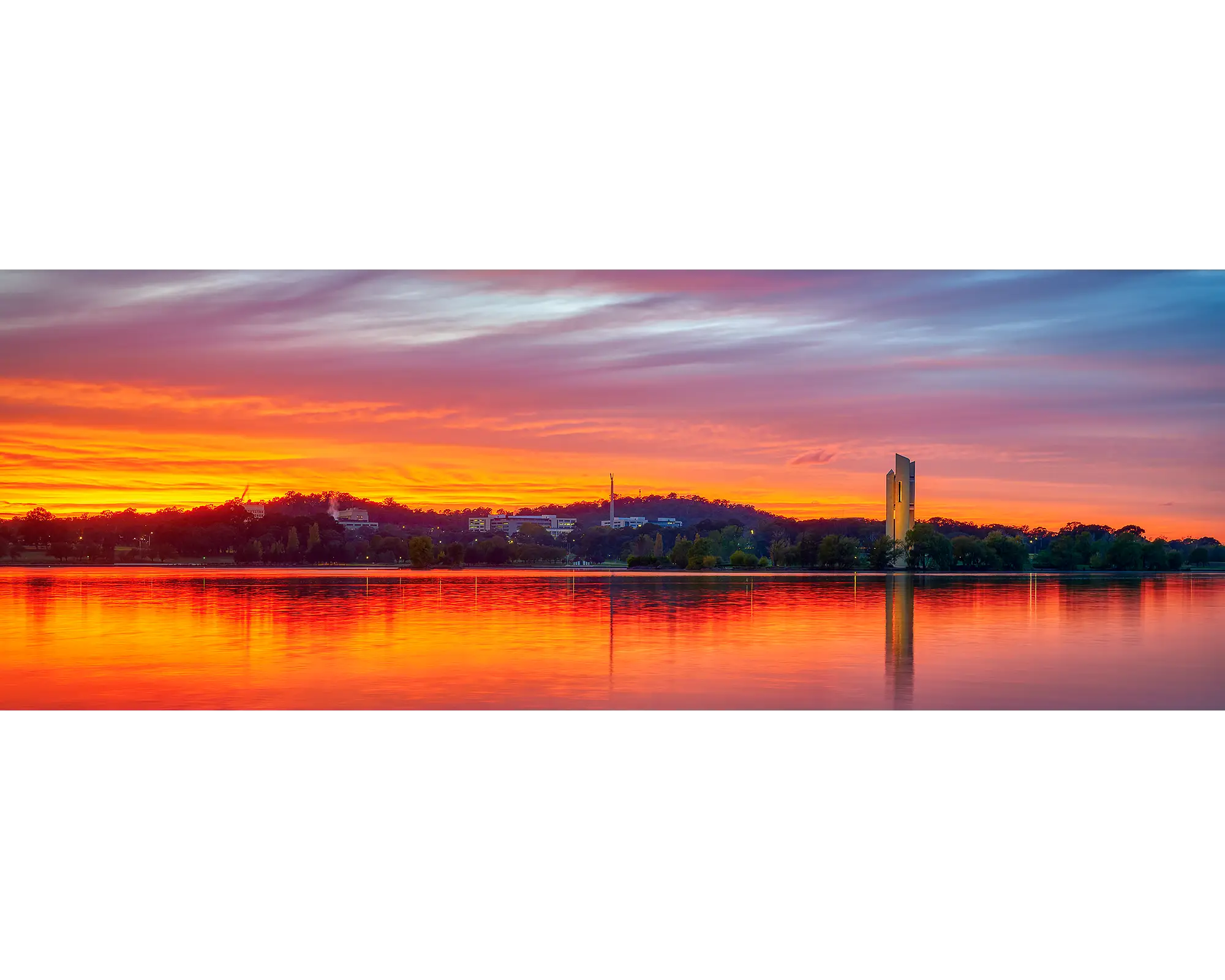 Scarlet sunrise over Russell Office and Lake Burley Griffin, Canberra.