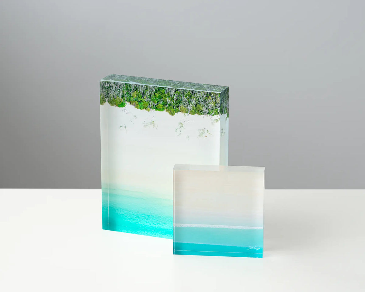 Sea Change acrylic block displayed with Cable Calm acrylic block. 