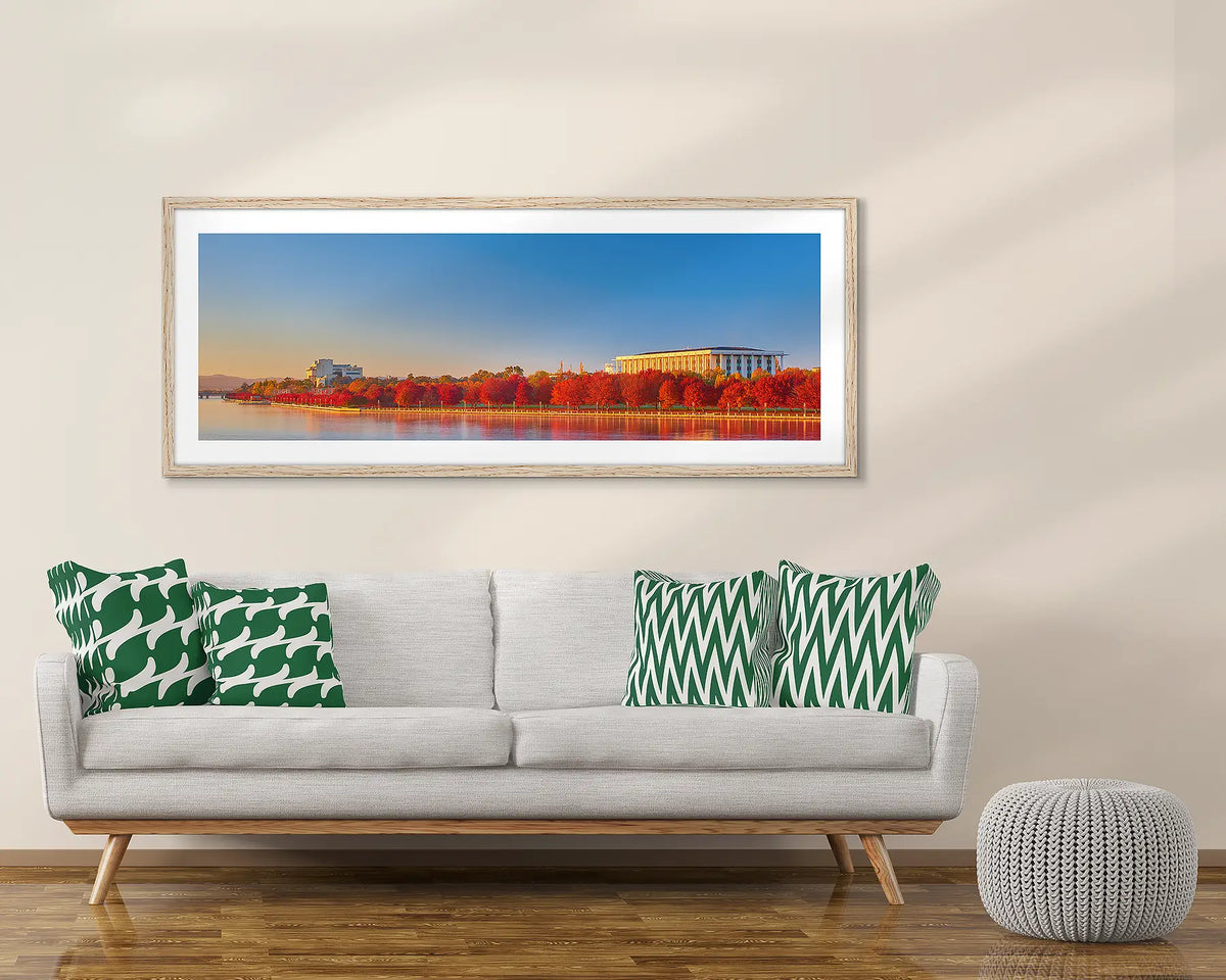 Simply Red. Canberra autumn artwork, in a Tasmanian Oak frame, above a couch. 