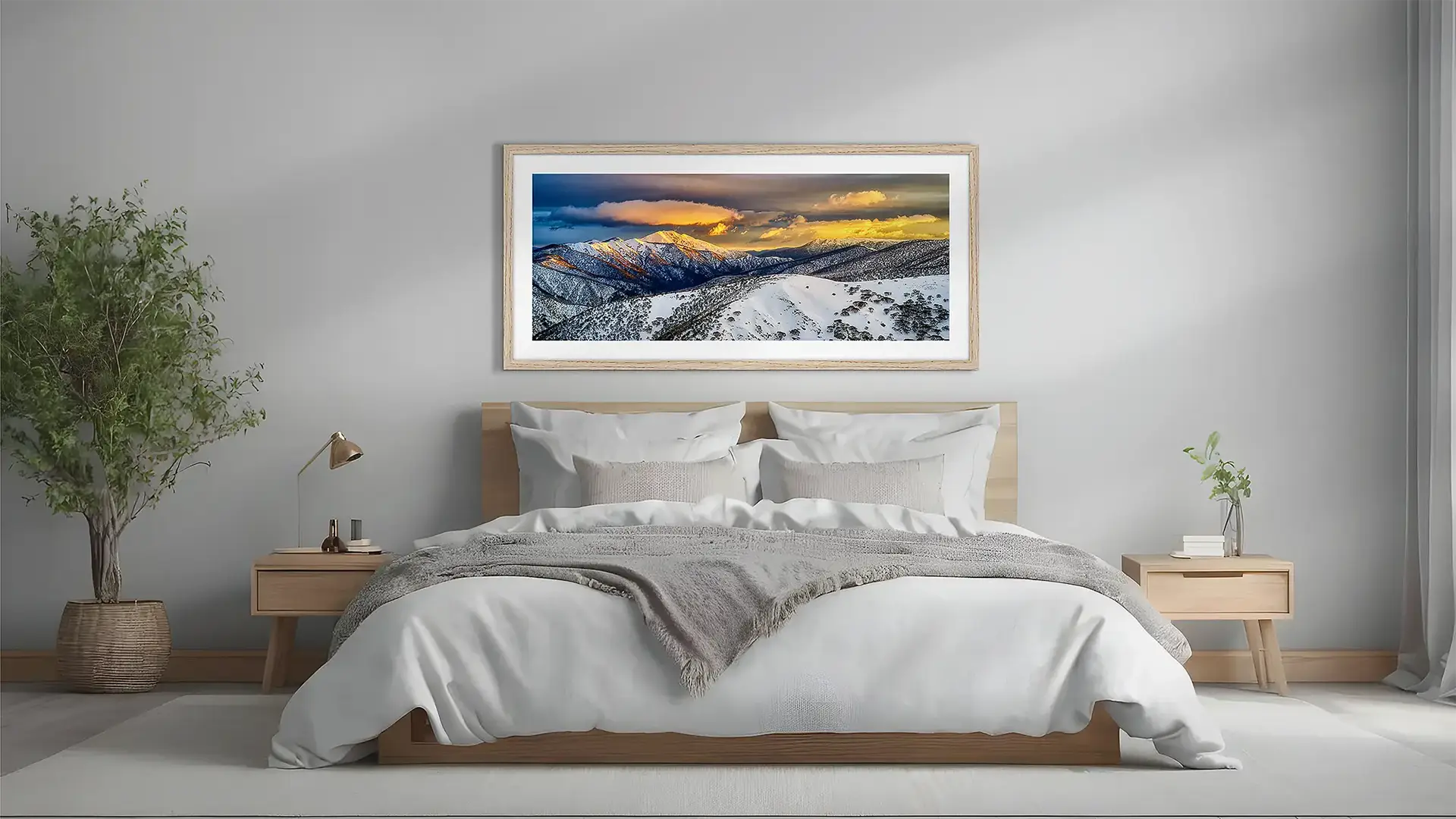 Snow wall art in tasmanian oak frame above a bed.