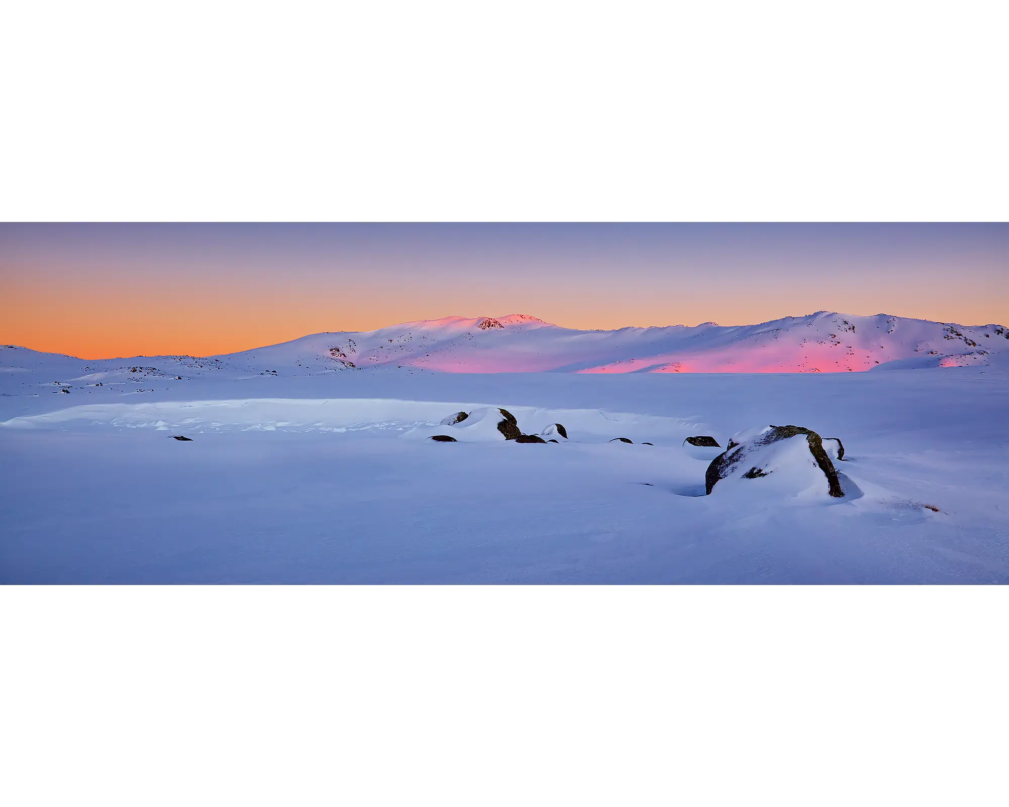 Sunrise over the Snowy River covered in snow, Kosciuszko National Park, NSW. 