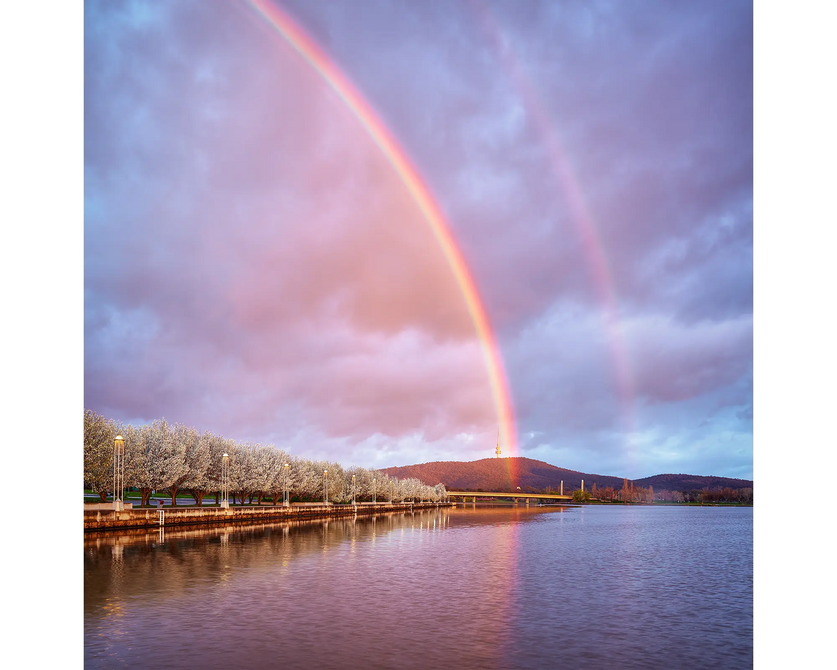 Double rainbow over Lake Burley Griffin with Black Mountain and Telstra Tower in the background, Canberra, ACT. 