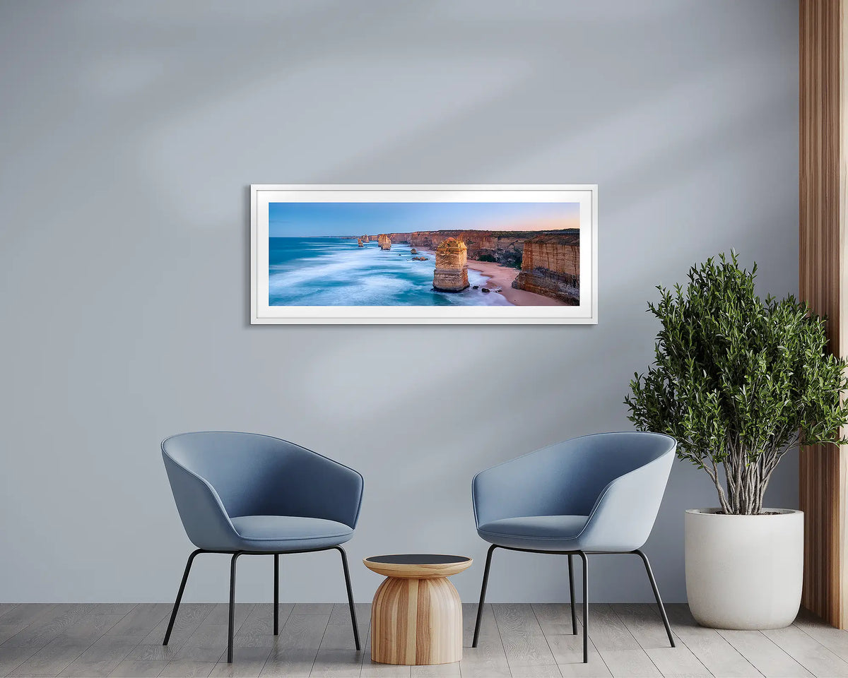 Standing Strong. Twelve apostles wall art, with a white frame, in a waiting room. 