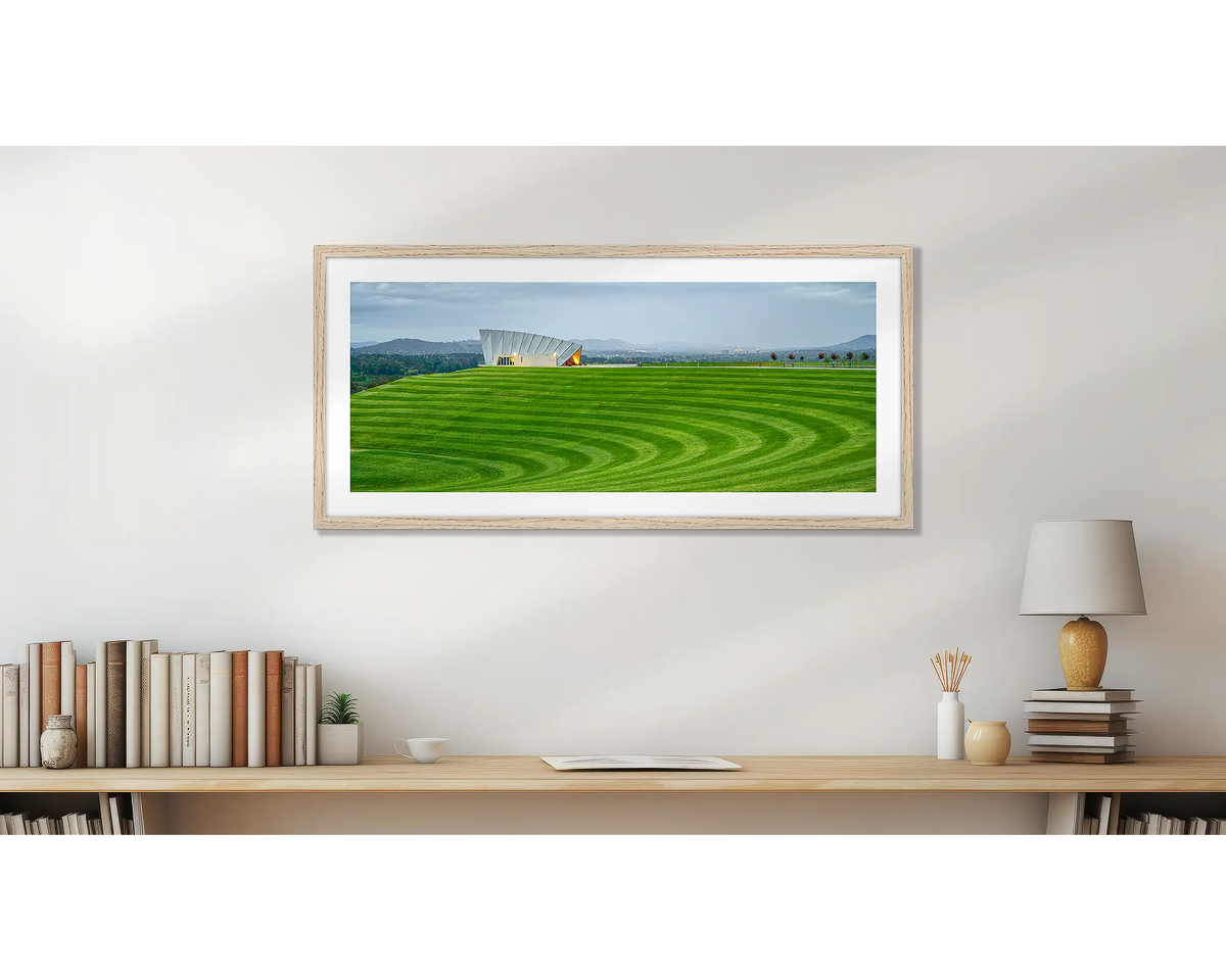 Stripes. Arboretum, Canberra wall art print, with a timber frame, hung above a small office shelf. 