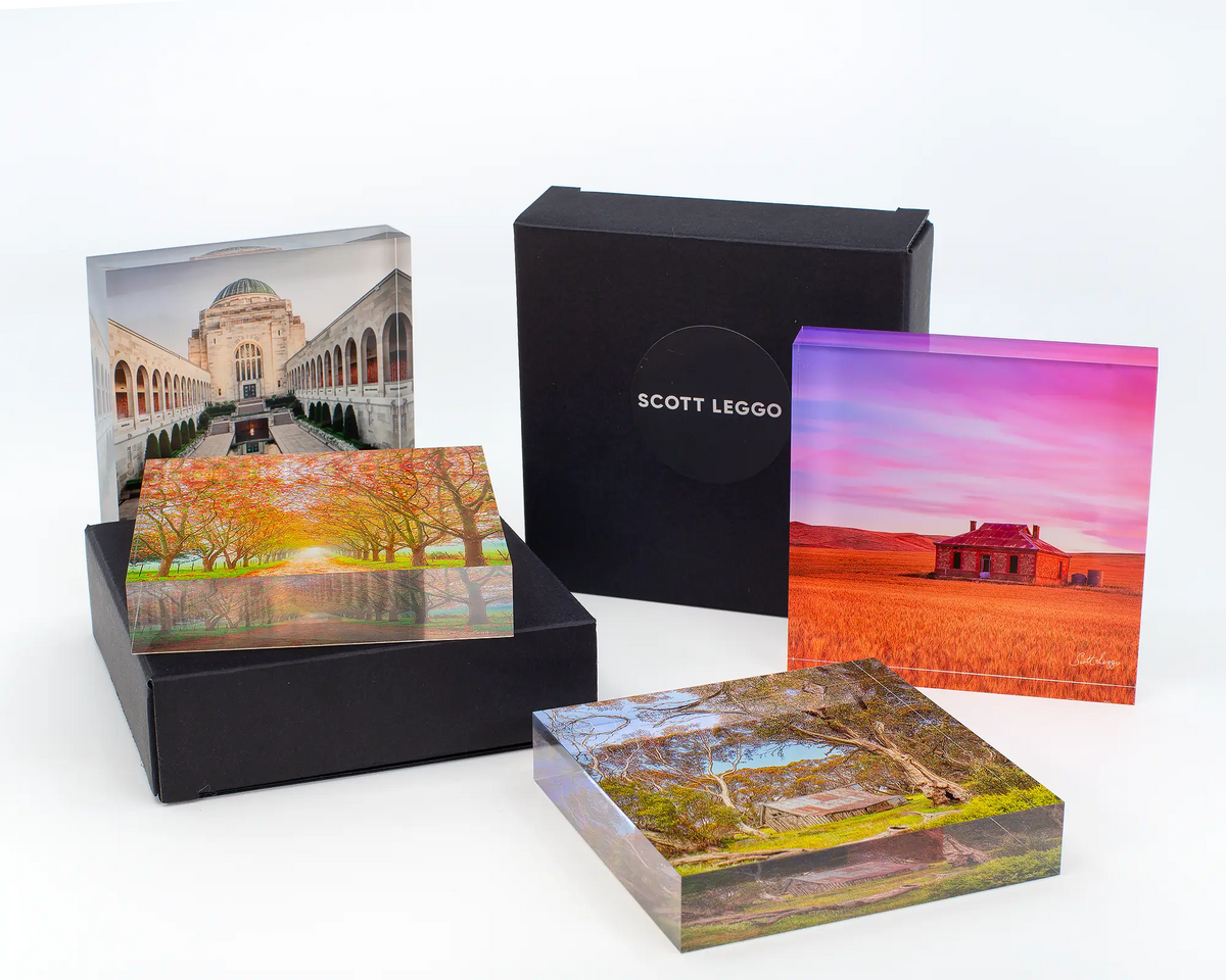 Summer in the High Country acrylic block displayed with other acrylic blocks and gift boxes. 