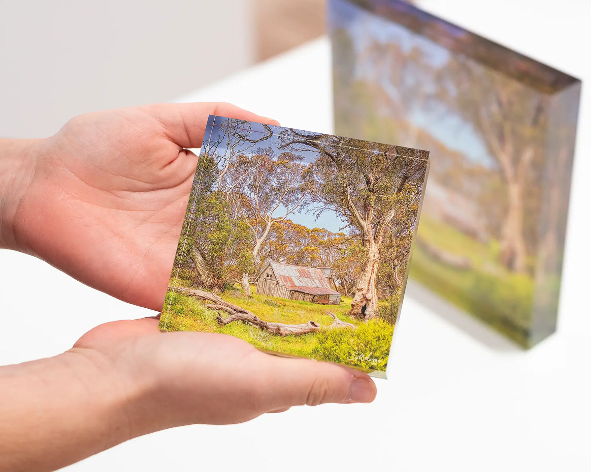 Summer in the High Country 10cm acrylic block being held. 