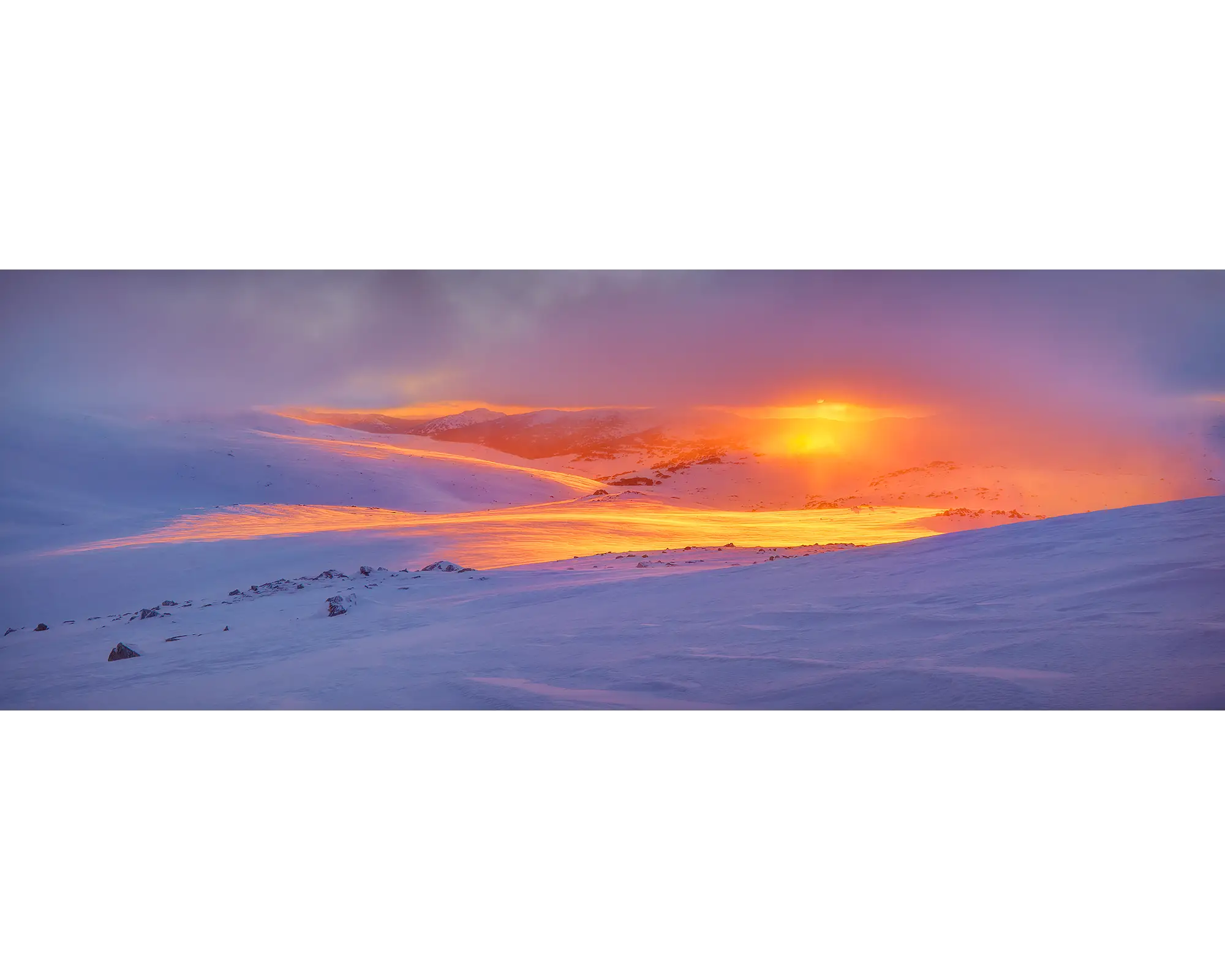 Foggy sunrise over back country snowfields in Kosciuszko National Park, NSW. 