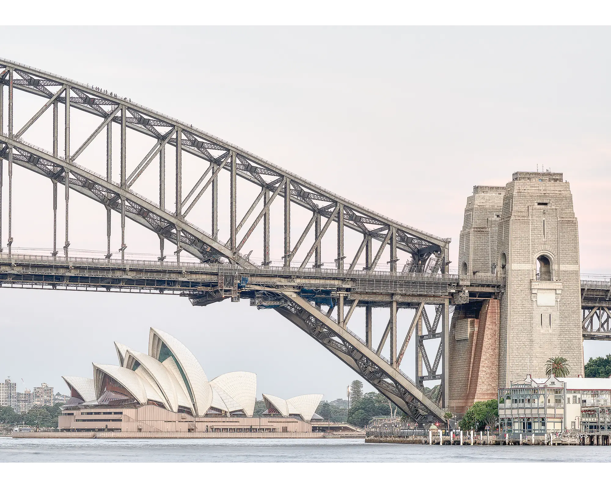 Sydney Icons - Sydney Harbour Bridge and the Sydney Opera House at sunset.