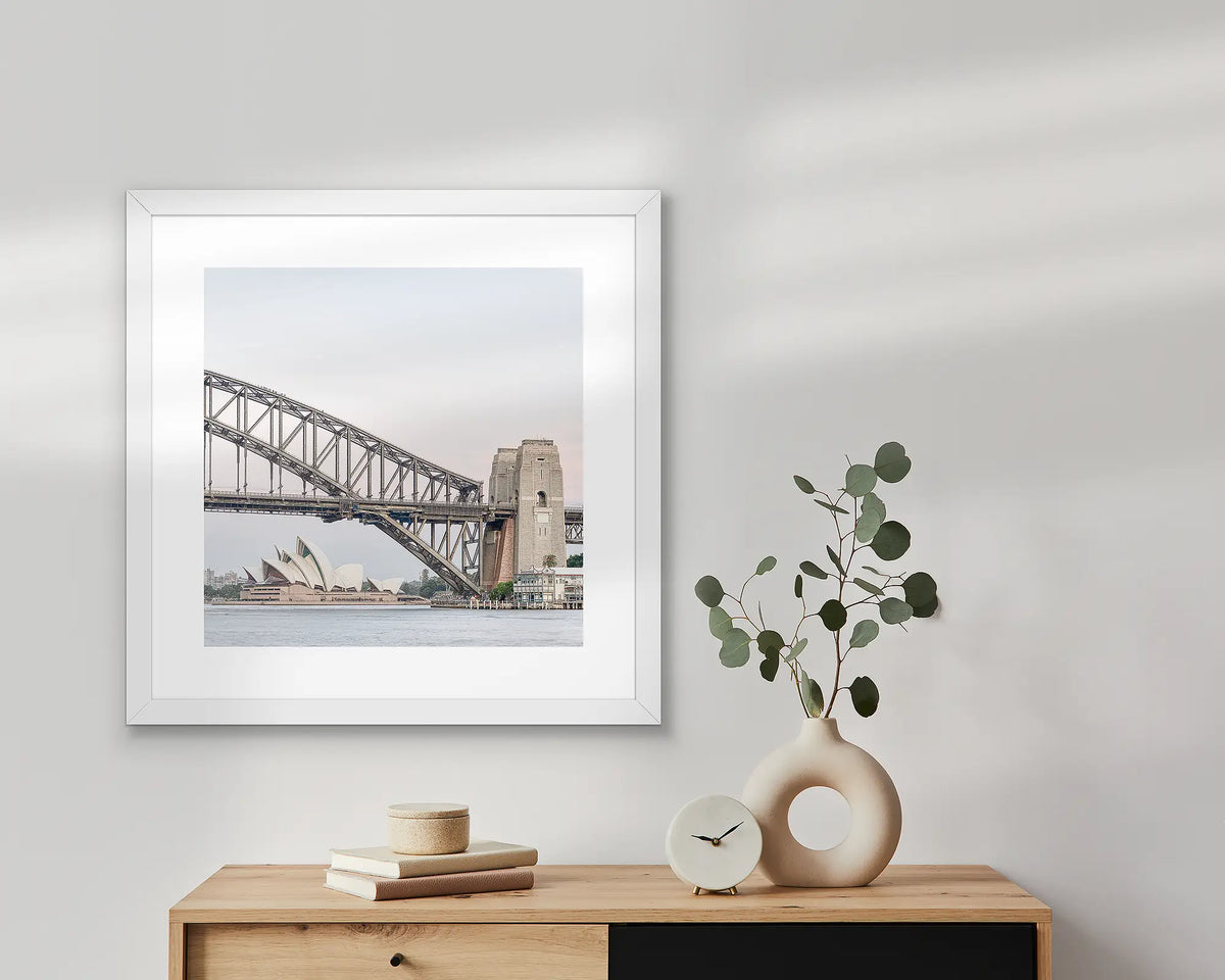 Sydney Icons wall art with white frame above a scandi table.